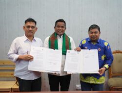 Penandatanganan NPHD, Bupati H. Zukri Minta KPU dan Bawaslu Ciptakan Pemilu Berjalan dengan Baik