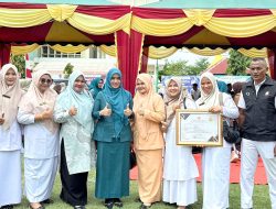 Ny. Erni Handayani Hadiri Upacara HKN Ke-61 di Aceh Timur